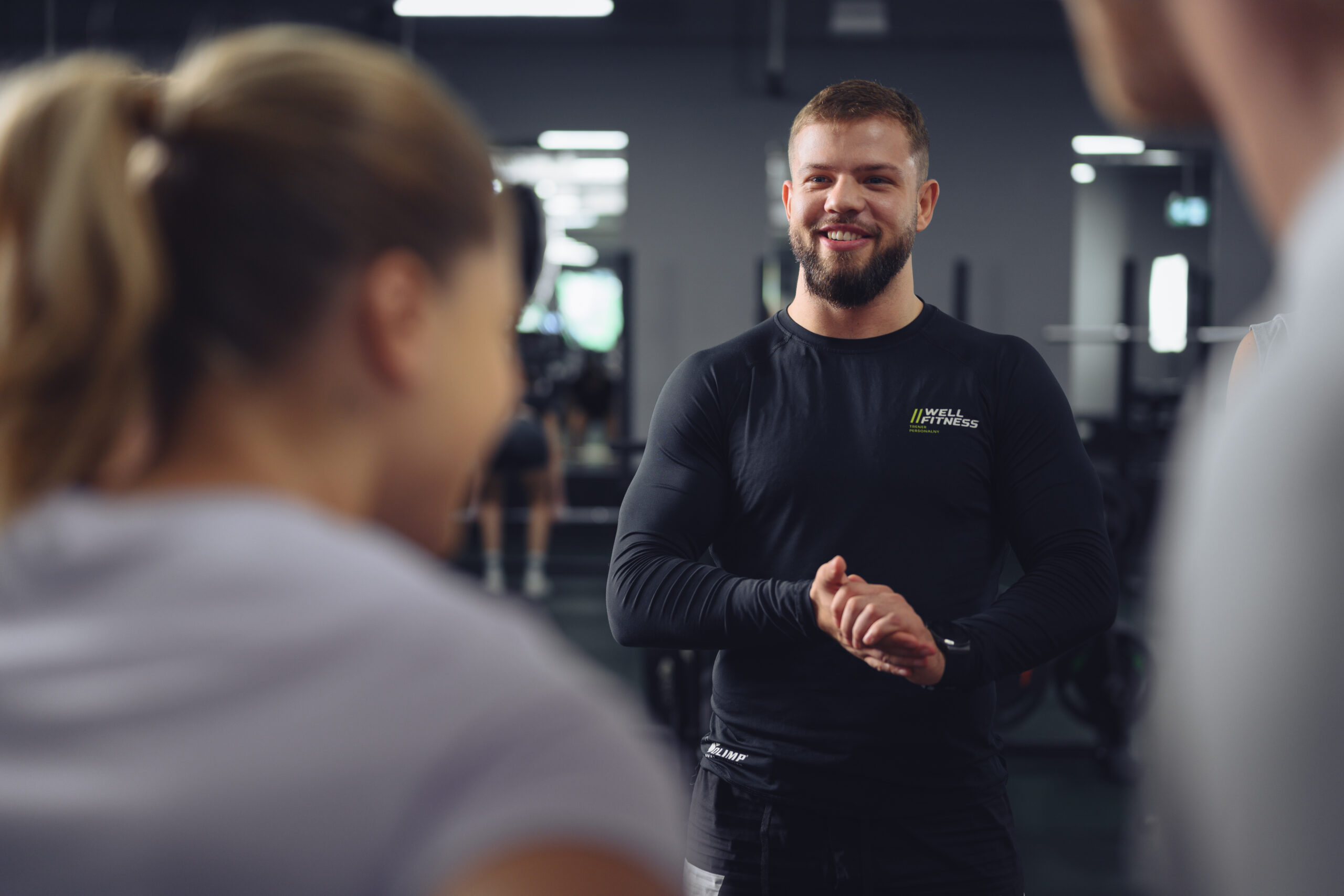 trener personalny ze swoimi podpoiecz